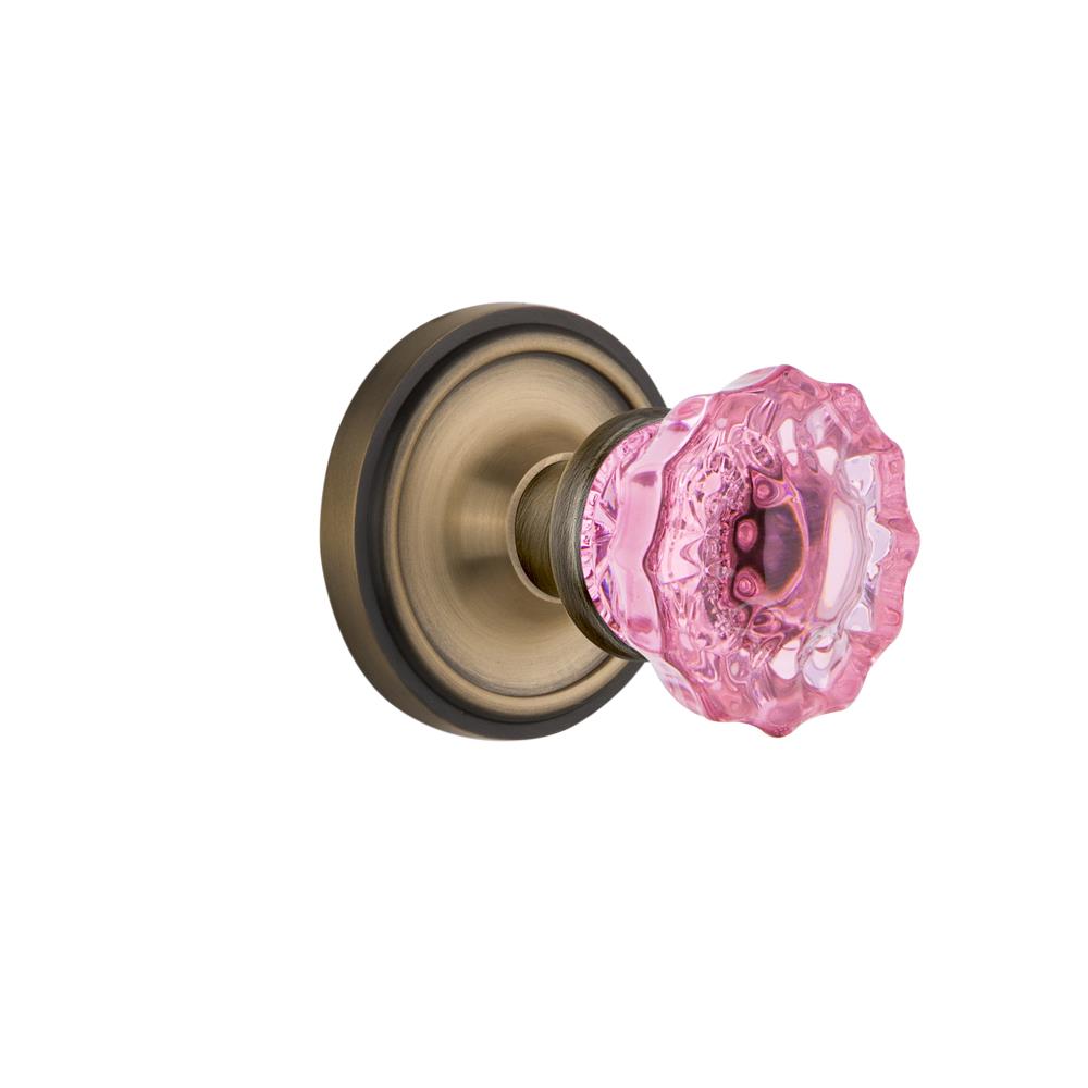 Nostalgic Warehouse CLACRP Colored Crystal Classic Rosette Passage Crystal Pink Glass Door Knob in Antique Brass